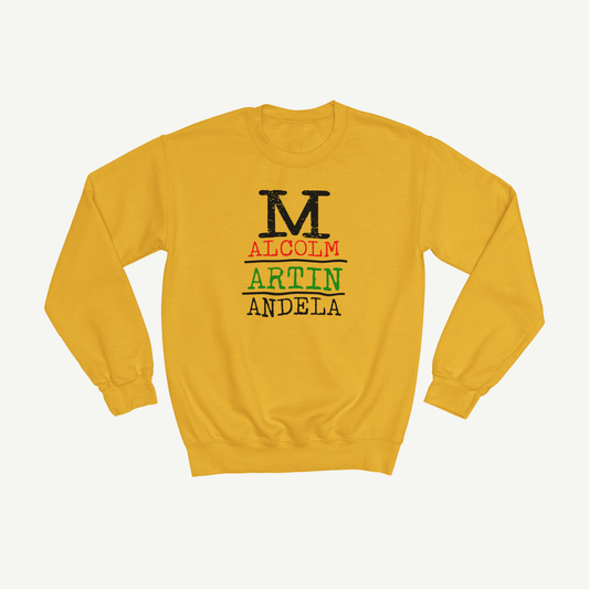Gold Malcolm Martin and Mandela global legacy crewneck sweatshirt on a warm neutral background